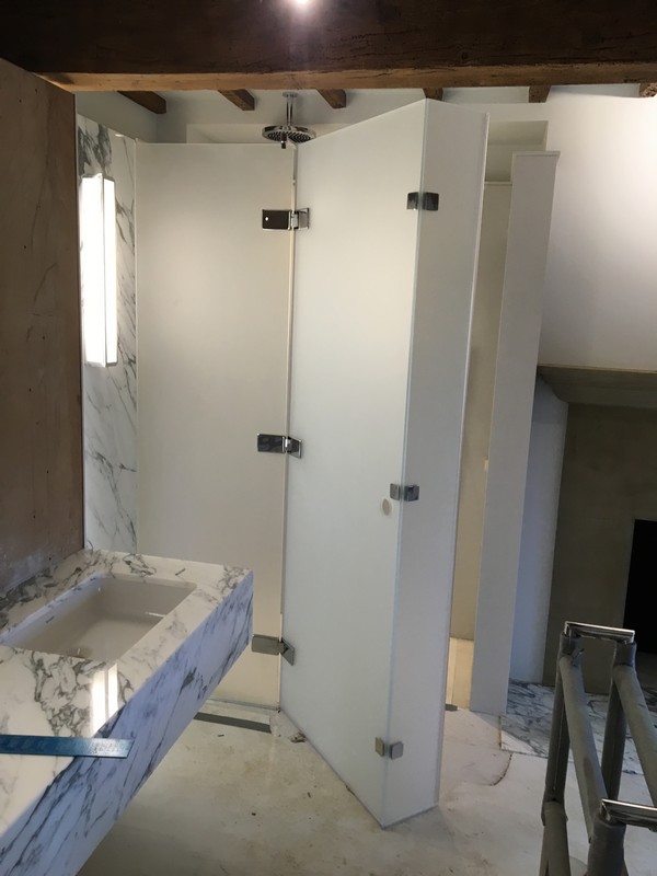 Bespoke frosted glass shower enclosure in Waltham Abbey luxury bathroom