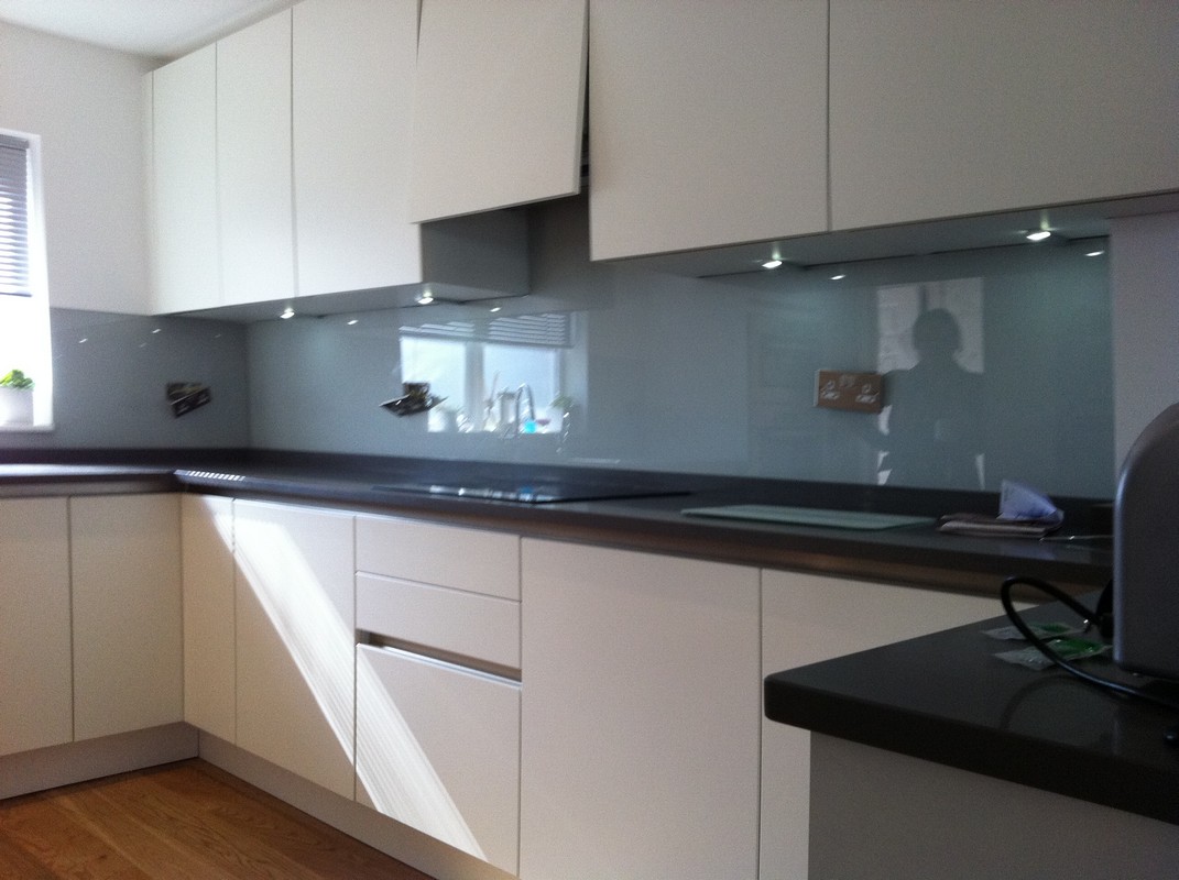 Grey glass kitchen splashback with LED lighting in Waltham Abbey