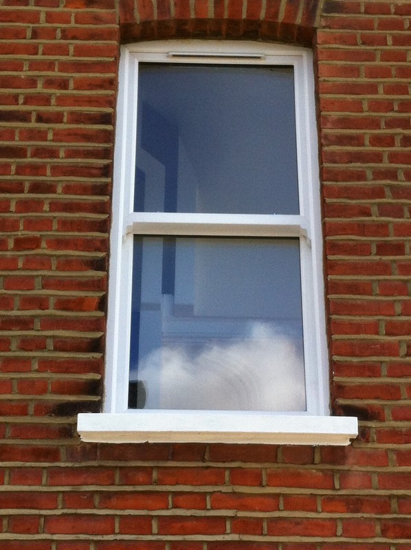 uPVC sash window on Victorian red brick house in Waltham Abbey